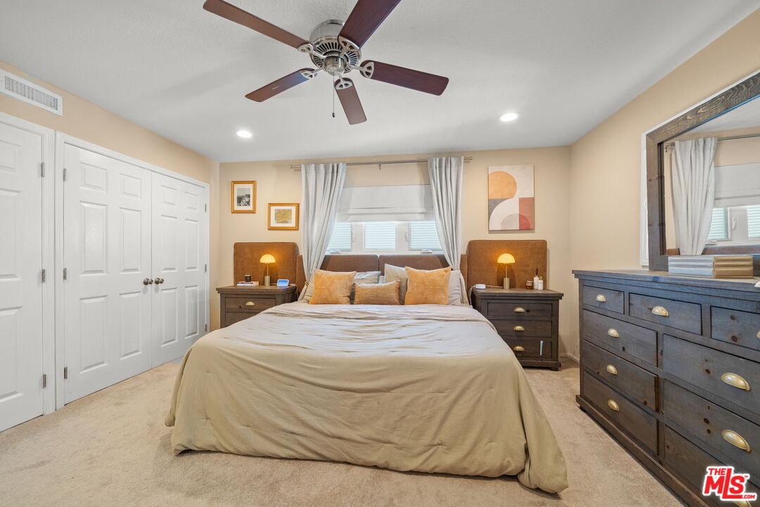 359 Termino Avenue Long Beach, CA 90814 - Photo 13 of 22 a bedroom with a bed and wooden floor