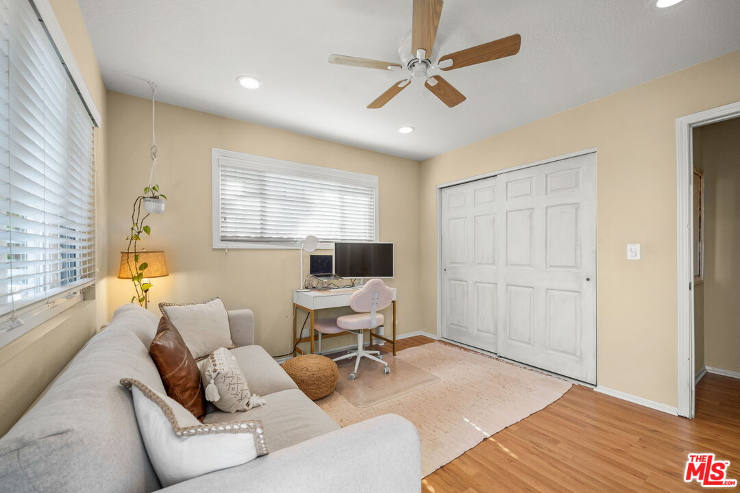 359 Termino Avenue Long Beach, CA 90814 - Photo 16 of 22 a living room with furniture and a large window