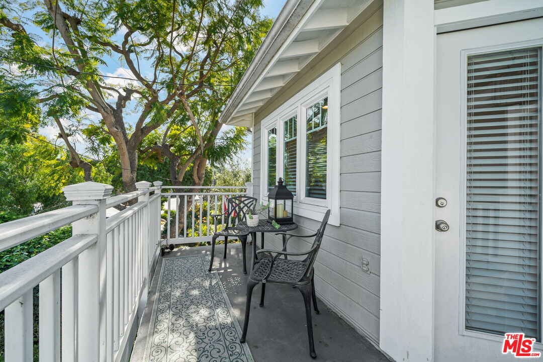 359 Termino Avenue Long Beach, CA 90814 - Photo 17 of 22 a view of a chairs and table in the balcony