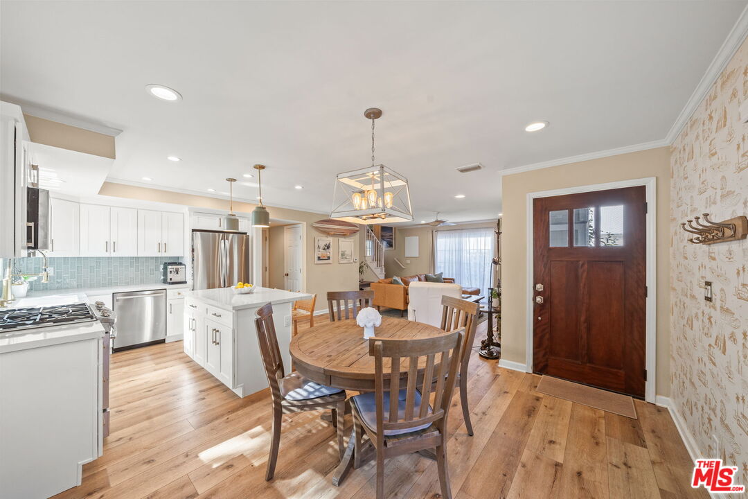 359 Termino Avenue Long Beach, CA 90814 - Photo 7 of 22 a view of a dining room with furniture window and wooden floor