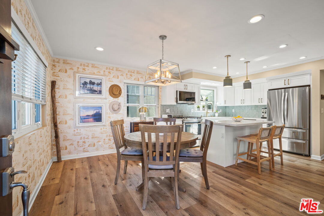 359 Termino Avenue Long Beach, CA 90814 - Photo 9 of 22 a view of a dining room with furniture window and wooden floor