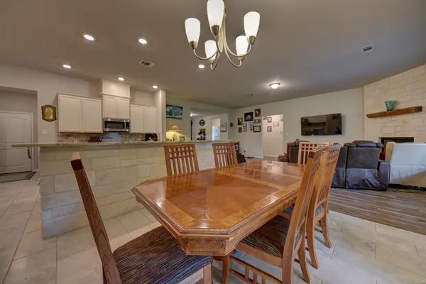 a view of a dining room with furniture