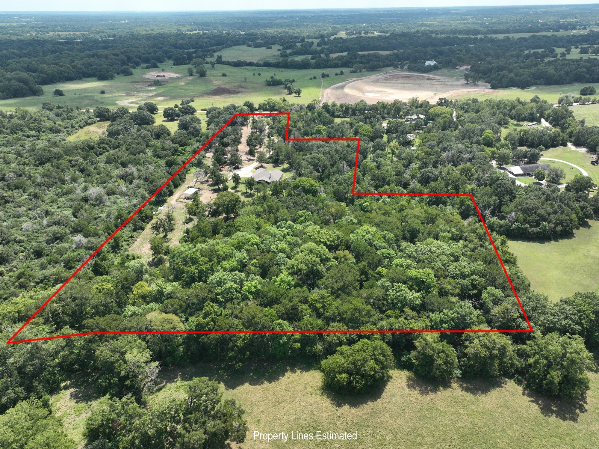2612 Tiemann Road New Ulm, TX 78950 - Photo 36 of 39 an aerial view of residential houses with outdoor space and trees
