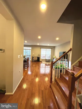 a view of entryway with wooden floor