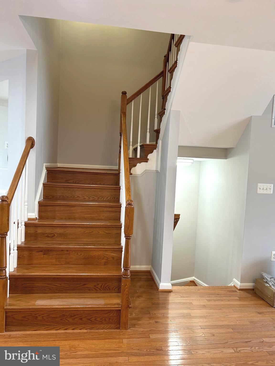 7358 Bloomington Court Springfield, VA 22150 - Photo 25 of 69 a view of entryway with wooden floor