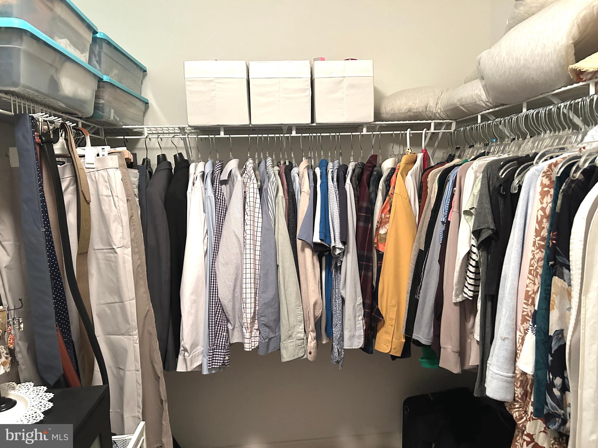 7358 Bloomington Court Springfield, VA 22150 - Photo 42 of 69 a view of walk in closet with clothes and shoes