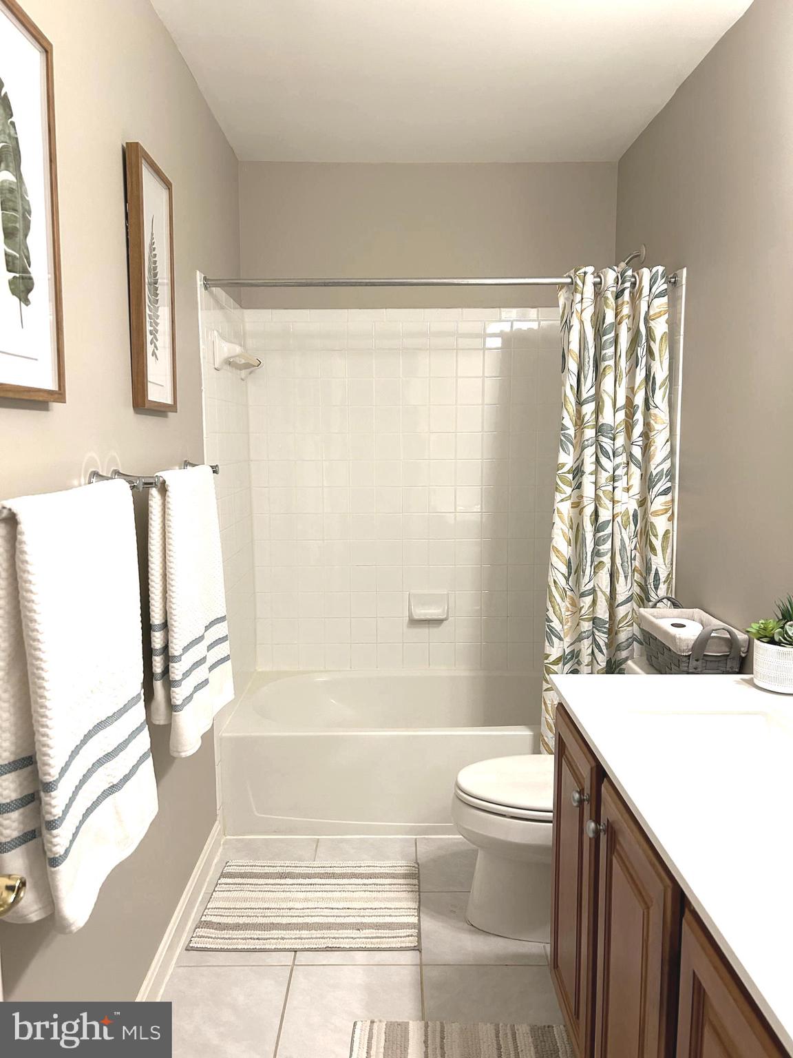 7358 Bloomington Court Springfield, VA 22150 - Photo 47 of 69 a bathroom with a sink a toilet and a bathtub