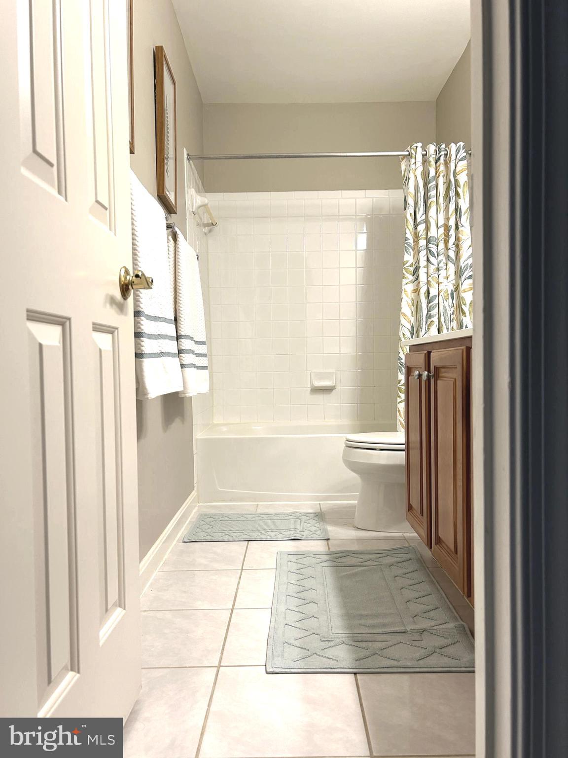 7358 Bloomington Court Springfield, VA 22150 - Photo 51 of 69 a bathroom with a toilet and a shower