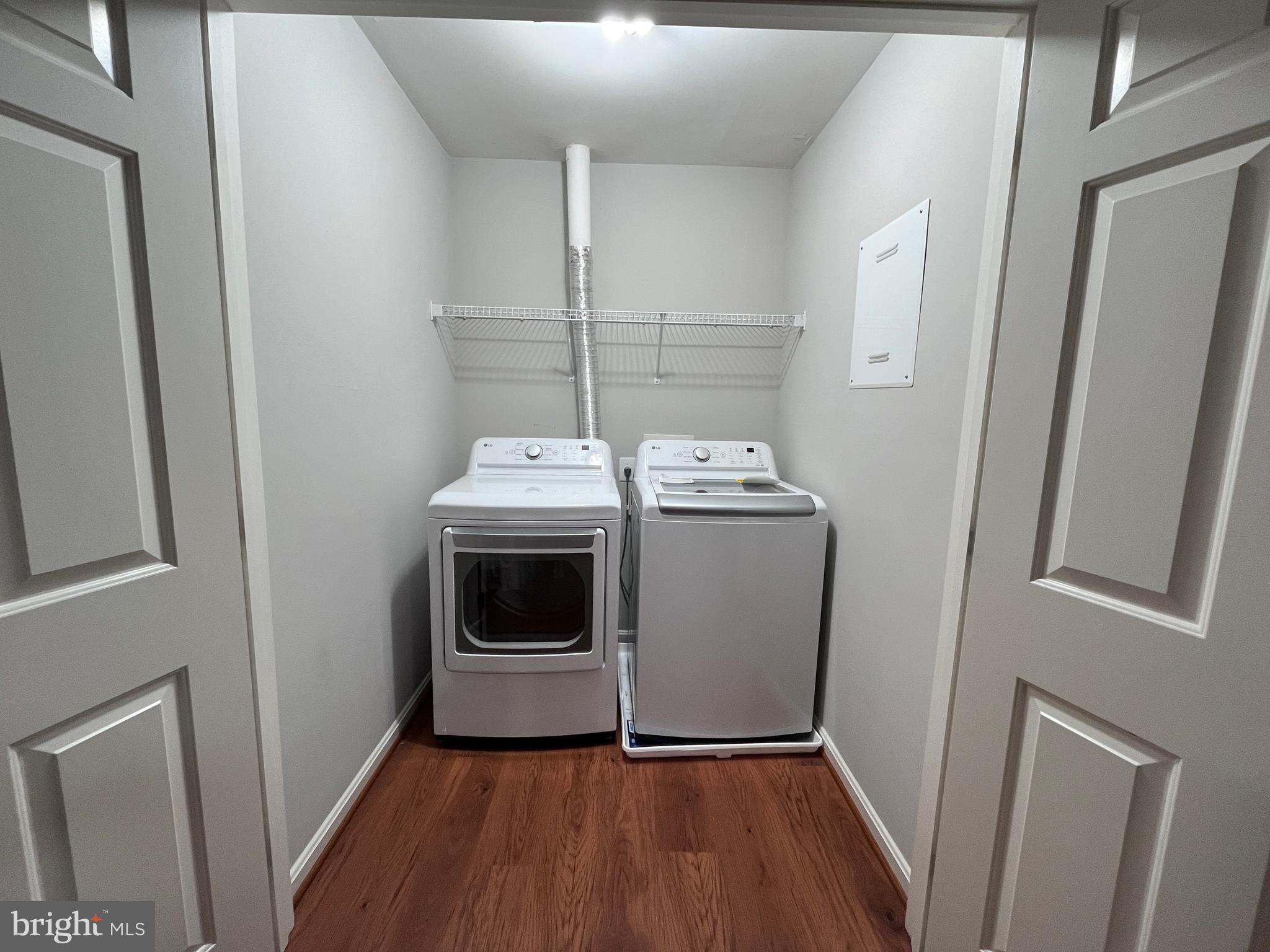 7358 Bloomington Court Springfield, VA 22150 - Photo 56 of 69 a utility room with dryer and washer