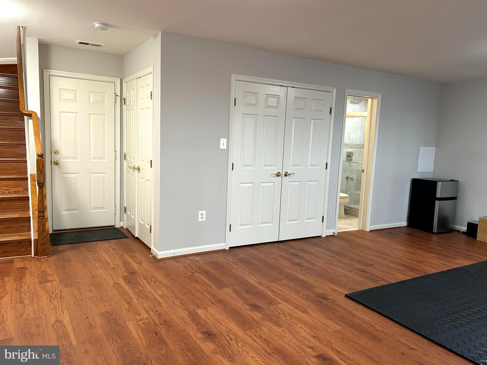 7358 Bloomington Court Springfield, VA 22150 - Photo 59 of 69 a bedroom with a bed and a walk in closet