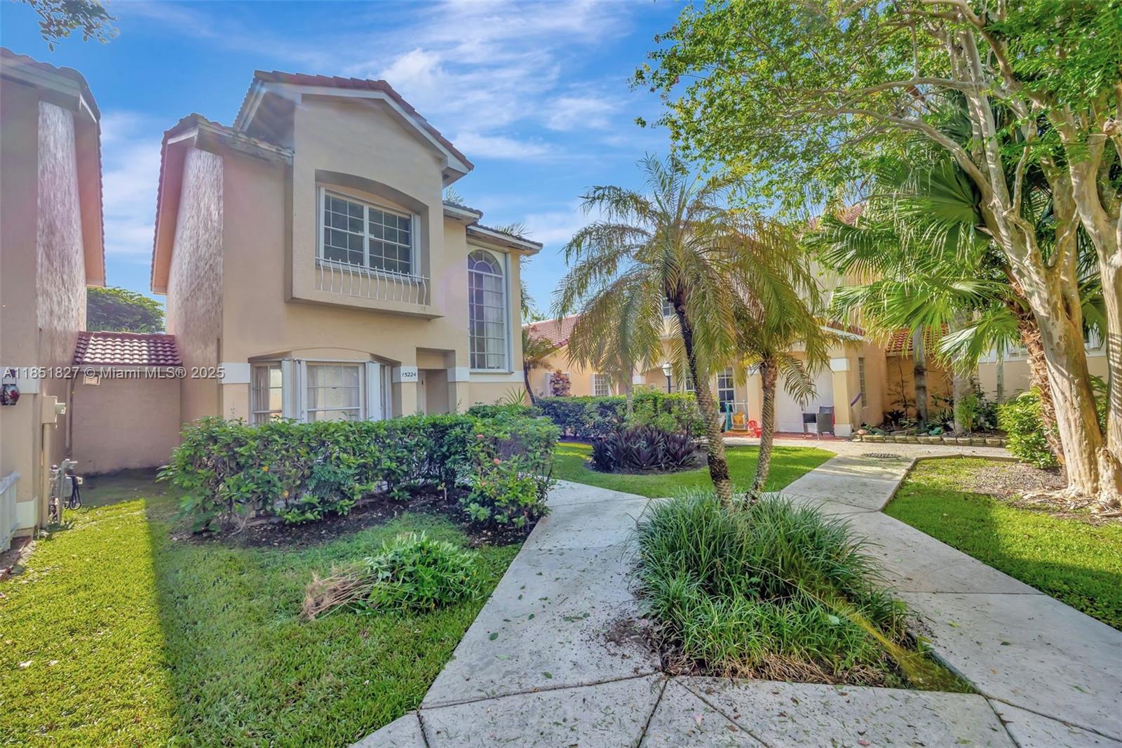 a house view with a garden space