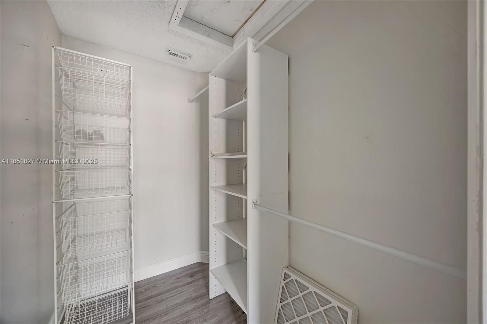 15224 Southwest 111th Street Miami, FL 33196 - Photo 24 of 27 a view of walk in closet