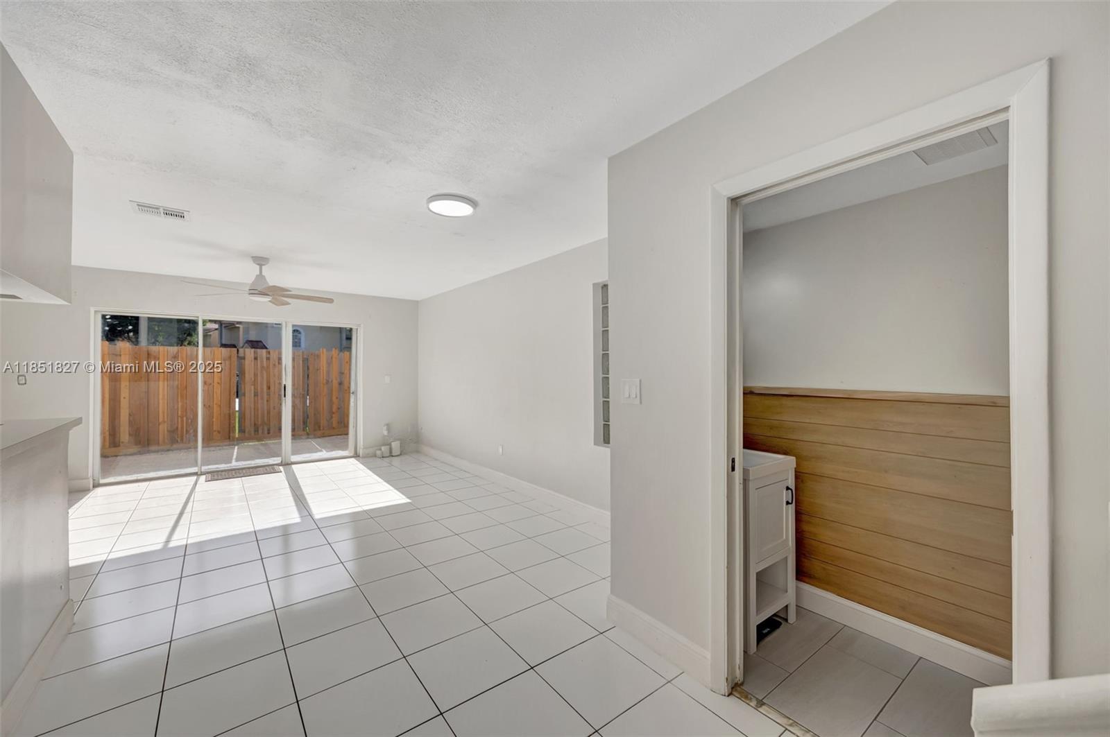 15224 Southwest 111th Street Miami, FL 33196 - Photo 5 of 27 a view of an entryway with a door