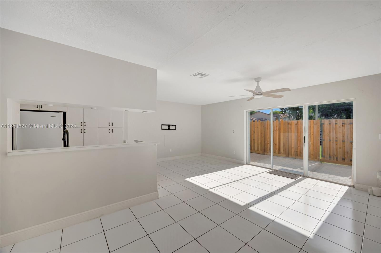 15224 Southwest 111th Street Miami, FL 33196 - Photo 9 of 27 a view of an empty room