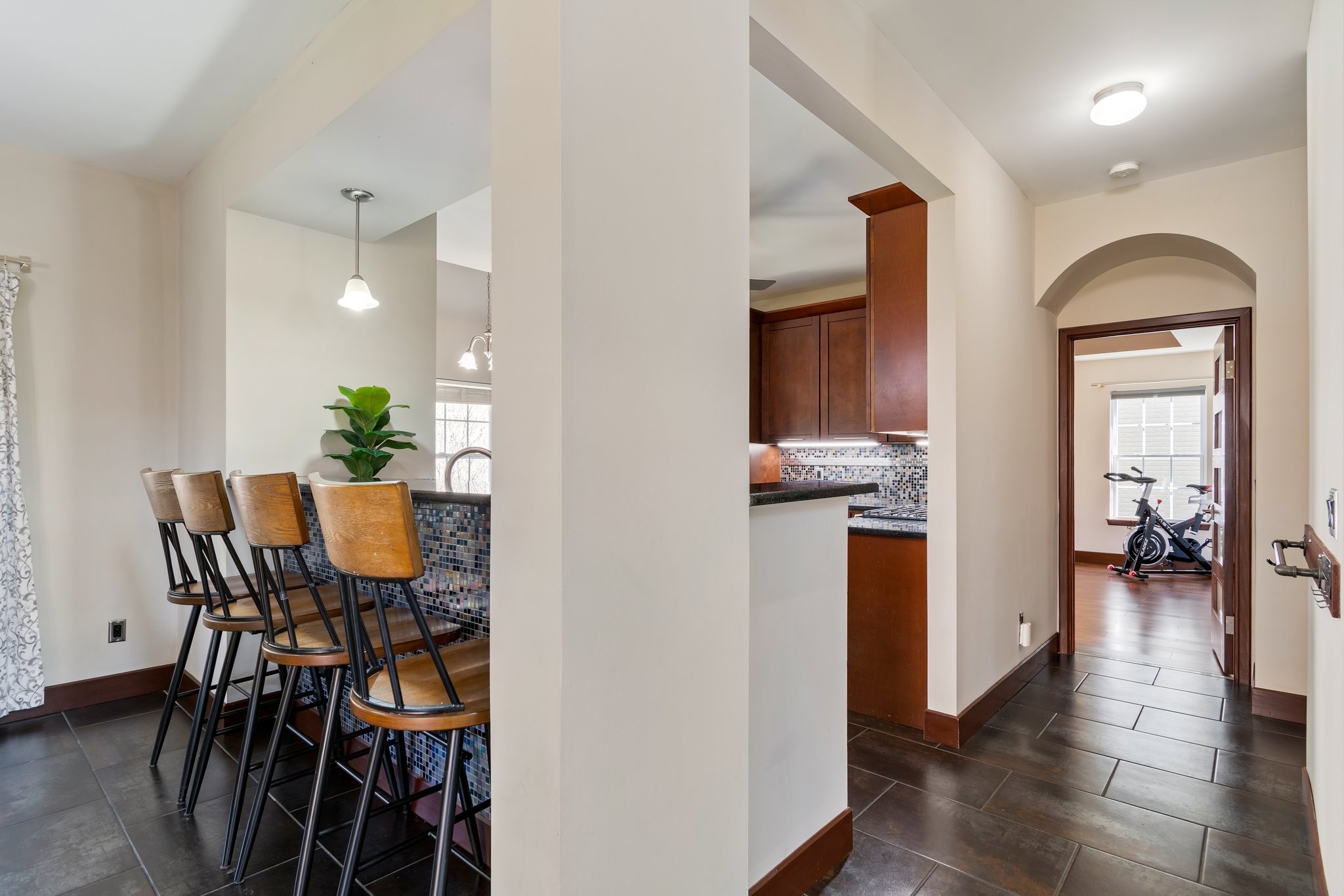 7245 Riverfront Drive Nashville, TN 37221 - Photo 17 of 74 a view of a dining room with furniture and wooden floor