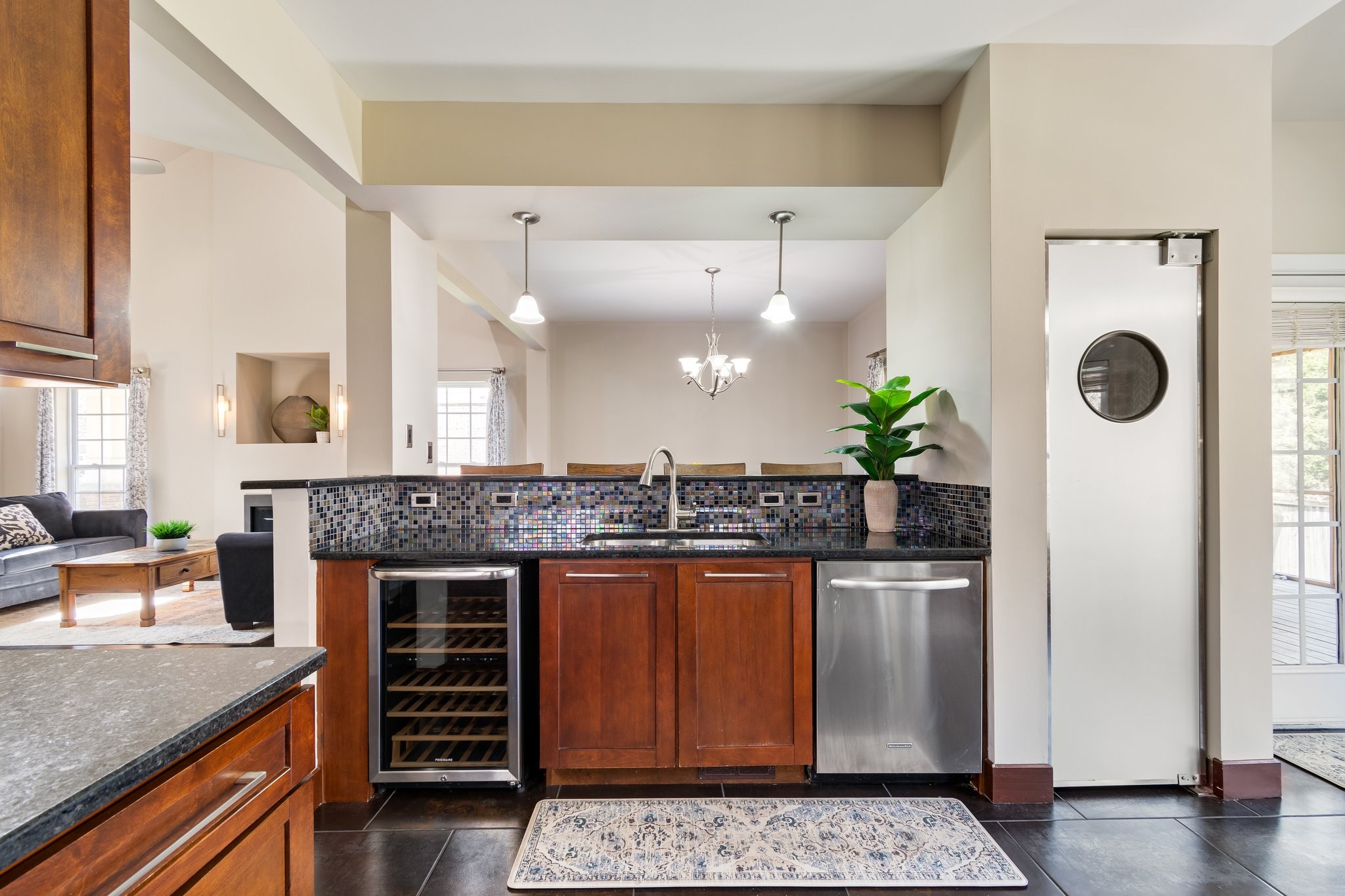 7245 Riverfront Drive Nashville, TN 37221 - Photo 20 of 74 a kitchen with stainless steel appliances granite countertop a stove a sink and a refrigerator