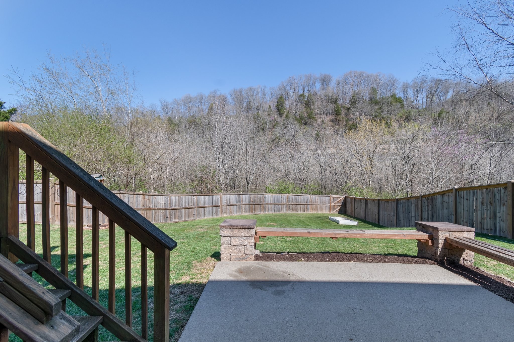 7245 Riverfront Drive Nashville, TN 37221 - Photo 27 of 74 a view of a park with large trees and a small yard