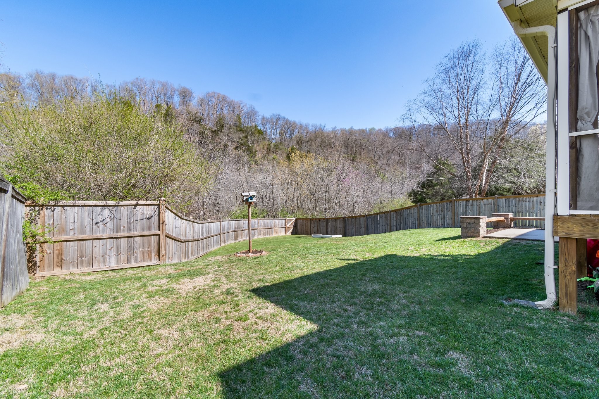 7245 Riverfront Drive Nashville, TN 37221 - Photo 33 of 74 a backyard of a house with lots of green space