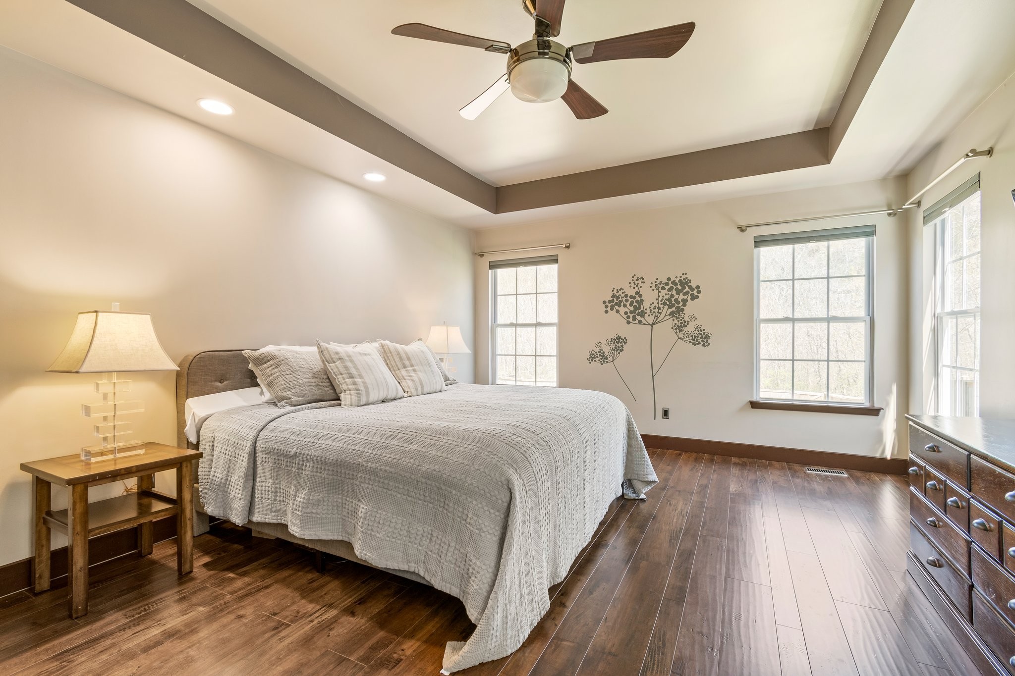 7245 Riverfront Drive Nashville, TN 37221 - Photo 34 of 74 a spacious bedroom with a bed and a window