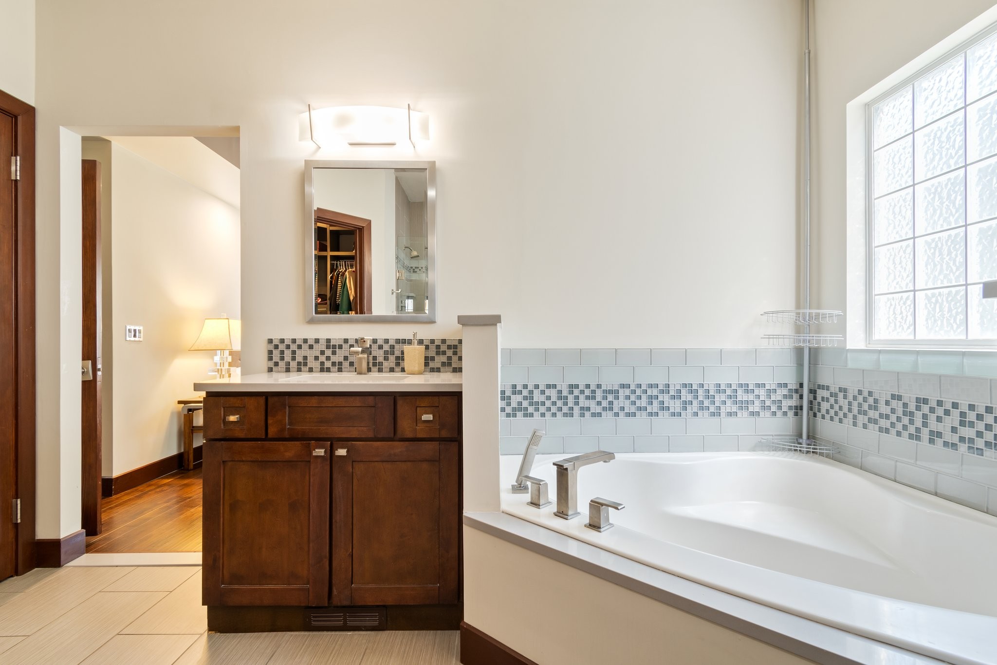 7245 Riverfront Drive Nashville, TN 37221 - Photo 38 of 74 a bathroom with a bathtub and a sink