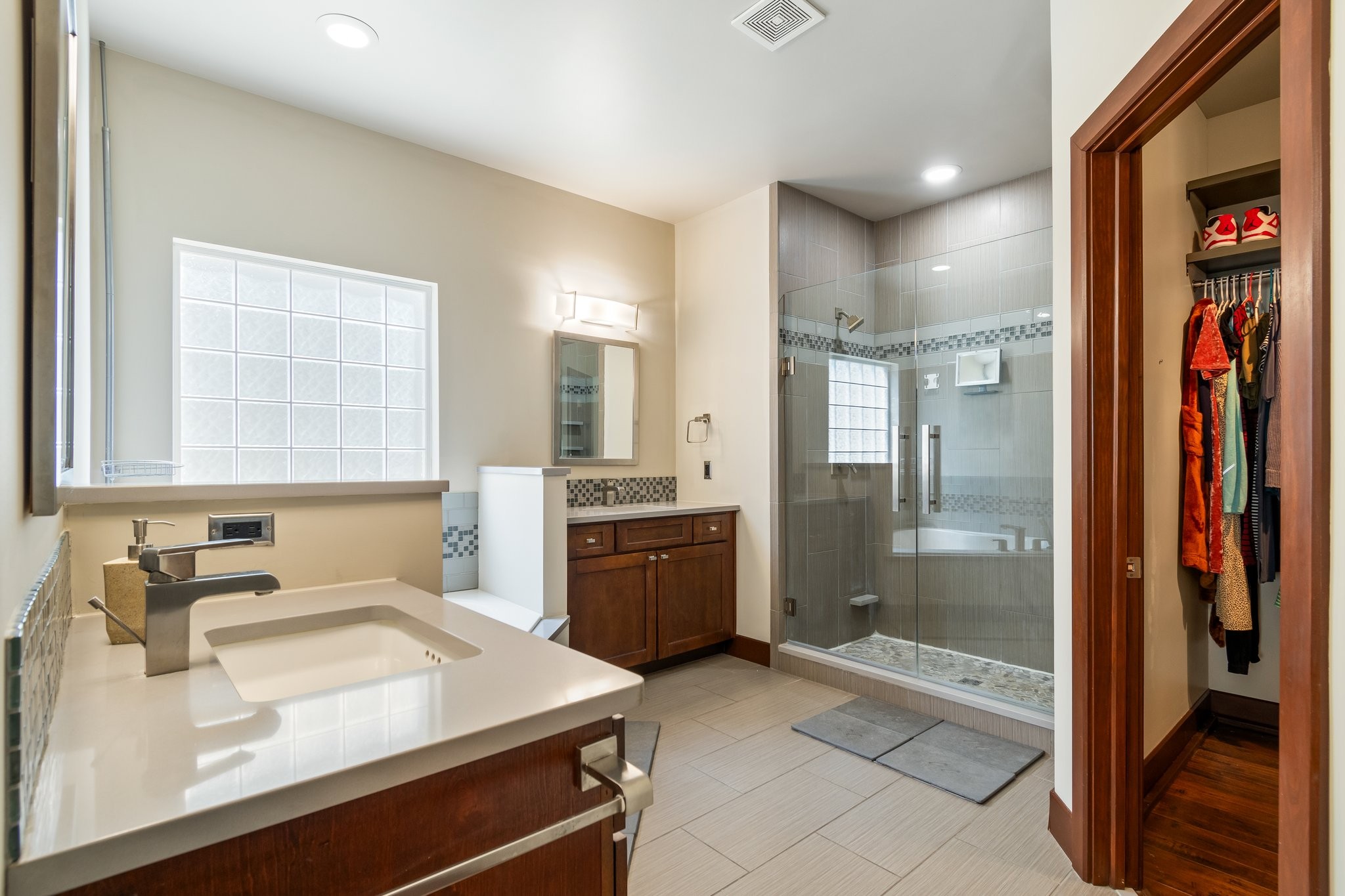 7245 Riverfront Drive Nashville, TN 37221 - Photo 40 of 74 a bathroom with a sink a toilet and shower