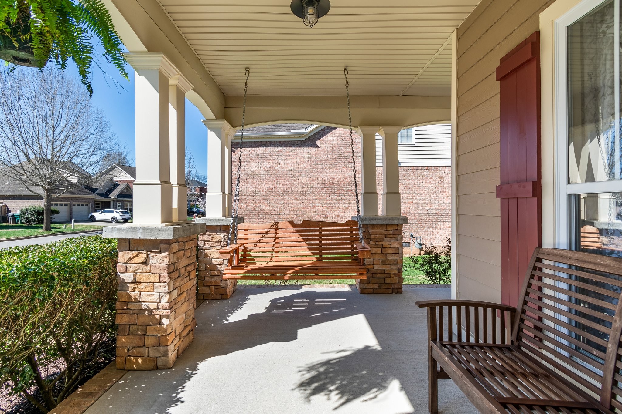 7245 Riverfront Drive Nashville, TN 37221 - Photo 4 of 74 a view of a house with a door and a porch