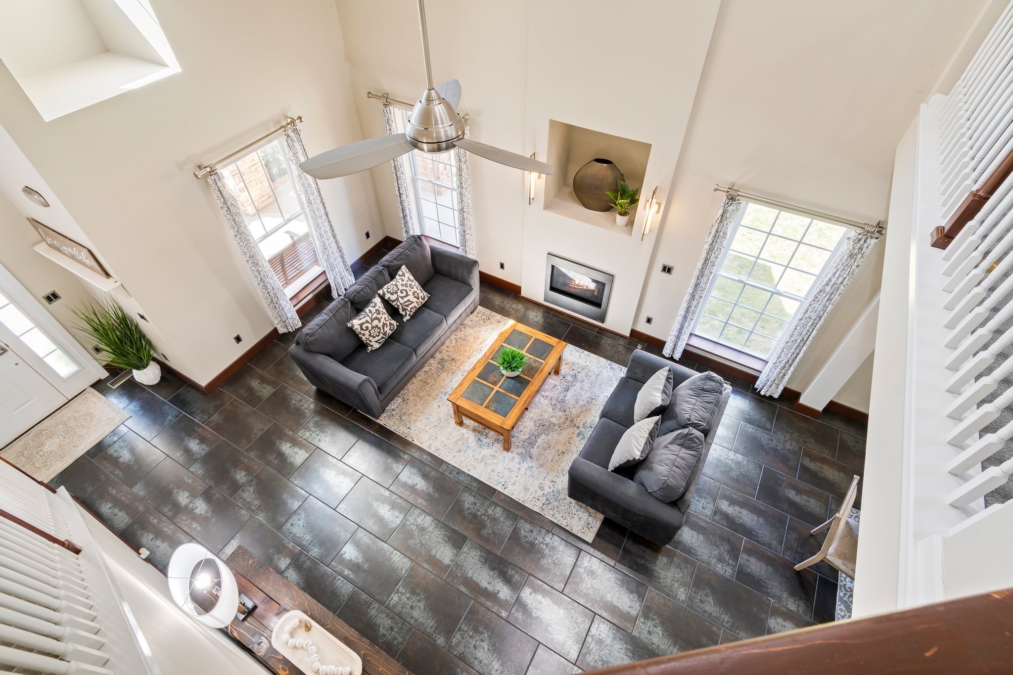 7245 Riverfront Drive Nashville, TN 37221 - Photo 44 of 74 a living room with furniture and a fireplace