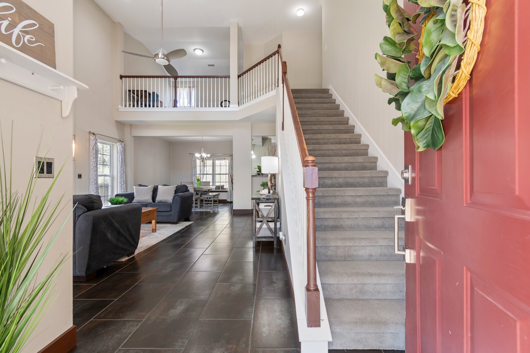 7245 Riverfront Drive Nashville, TN 37221 - Photo 5 of 74 a living room with furniture and a potted plant