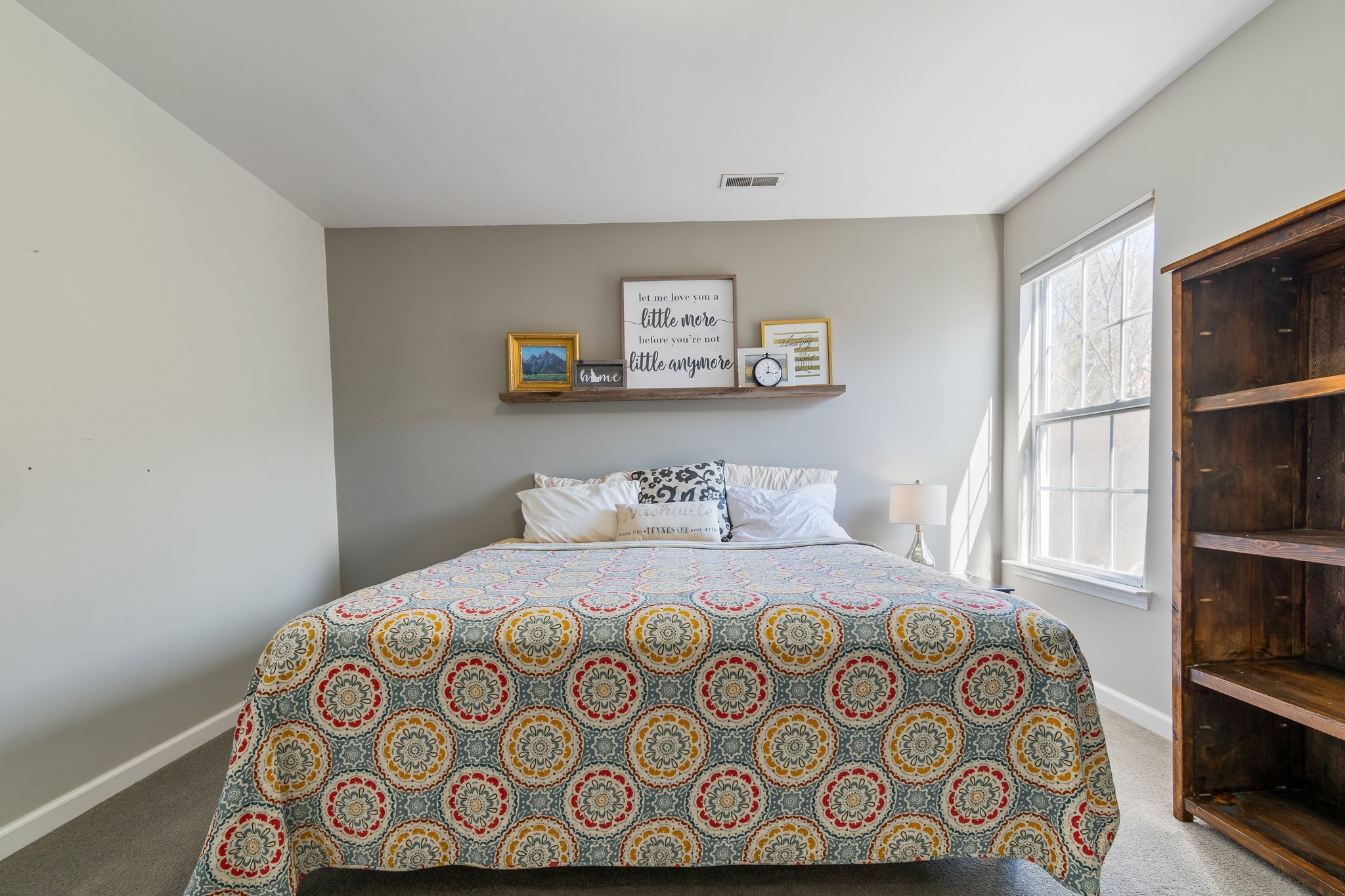 7245 Riverfront Drive Nashville, TN 37221 - Photo 51 of 74 a bedroom with a bed and window