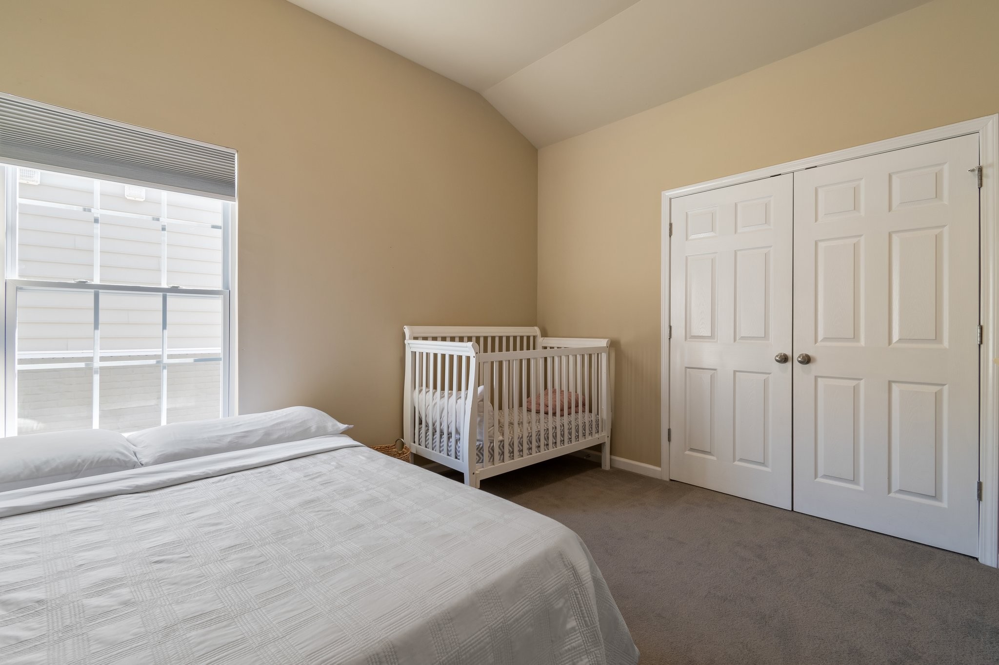 7245 Riverfront Drive Nashville, TN 37221 - Photo 53 of 74 a bedroom with a bed and a window