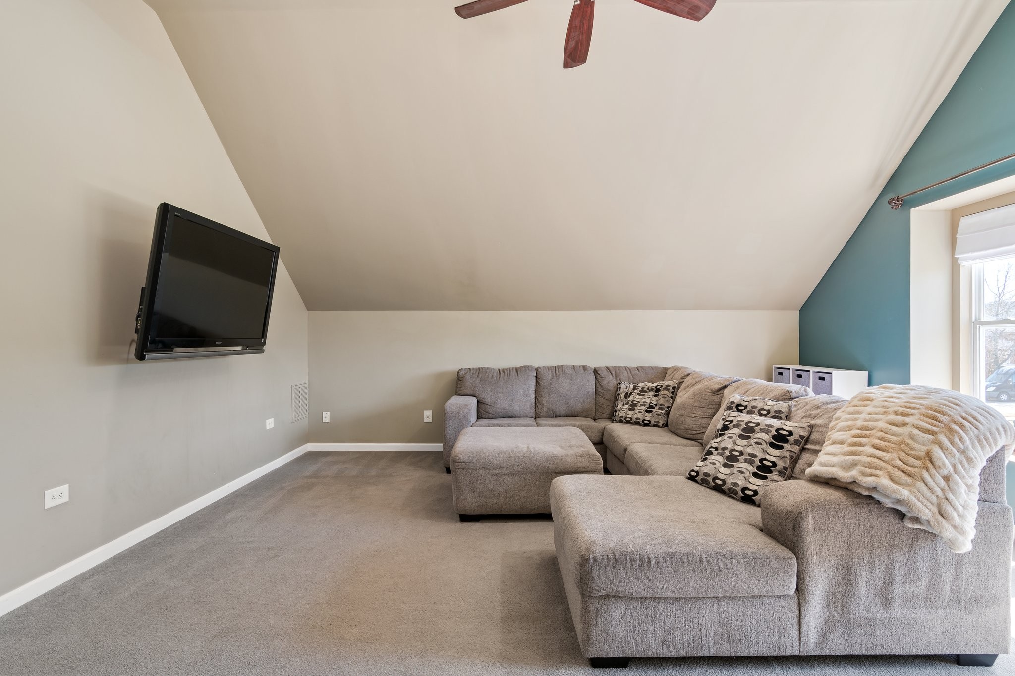 7245 Riverfront Drive Nashville, TN 37221 - Photo 59 of 74 a living room with furniture and a flat screen tv