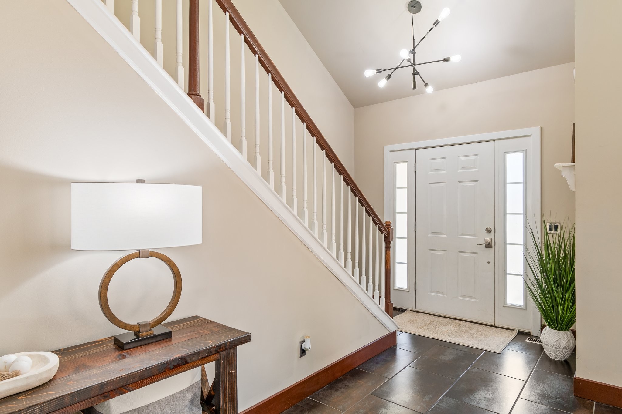 7245 Riverfront Drive Nashville, TN 37221 - Photo 6 of 74 a view of a hallway with wooden floor and entryway