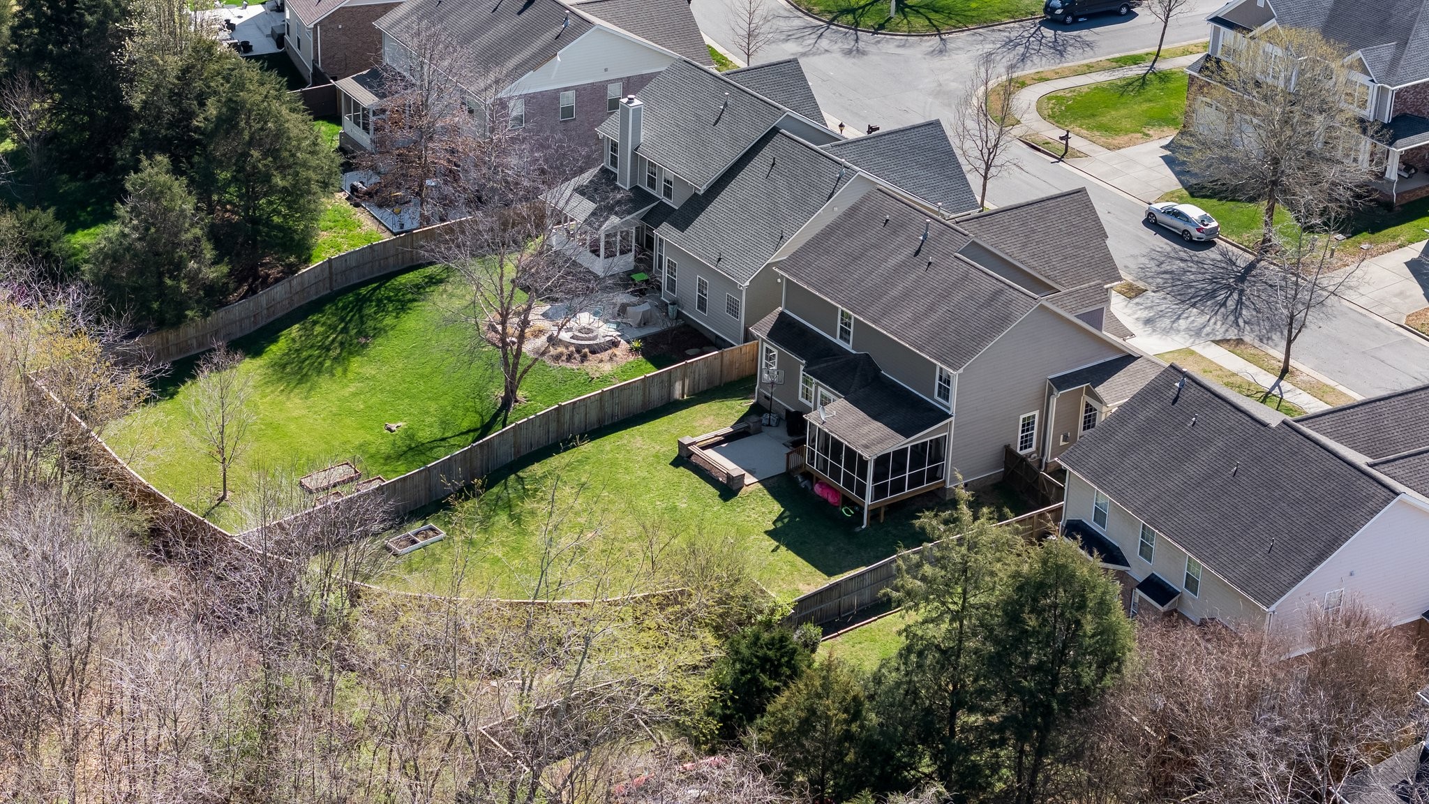 7245 Riverfront Drive Nashville, TN 37221 - Photo 63 of 74 an aerial view of a house with a swimming pool and outdoor space