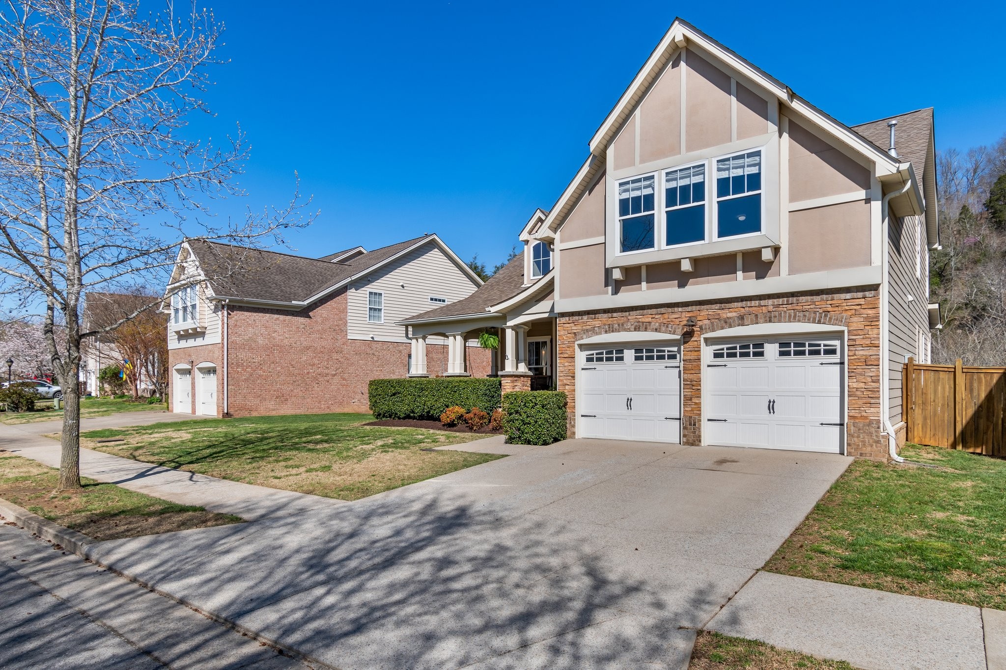 7245 Riverfront Drive Nashville, TN 37221 - Photo 74 of 74 a view of a house with a yard