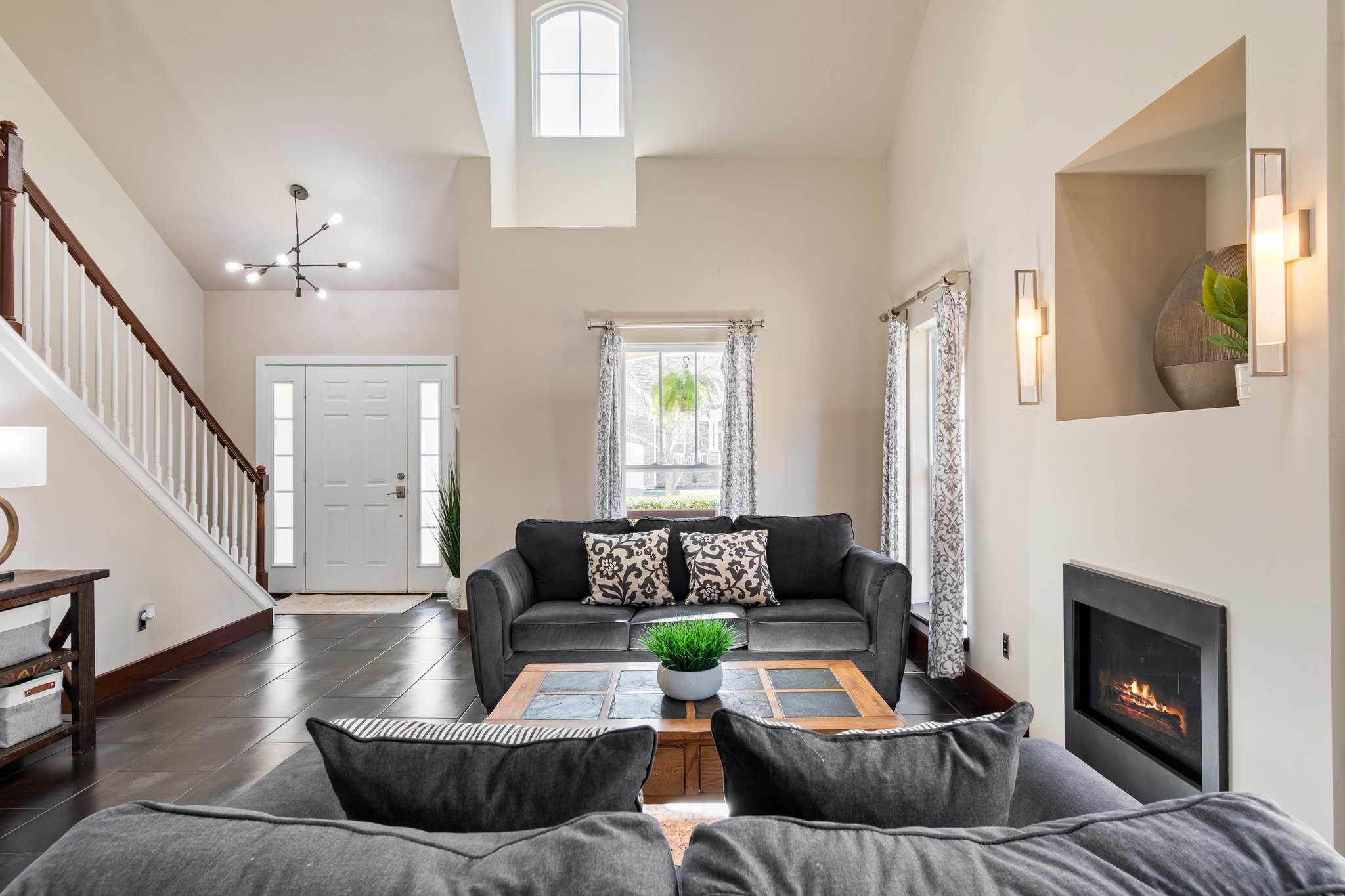 7245 Riverfront Drive Nashville, TN 37221 - Photo 8 of 74 a living room with furniture and a fireplace
