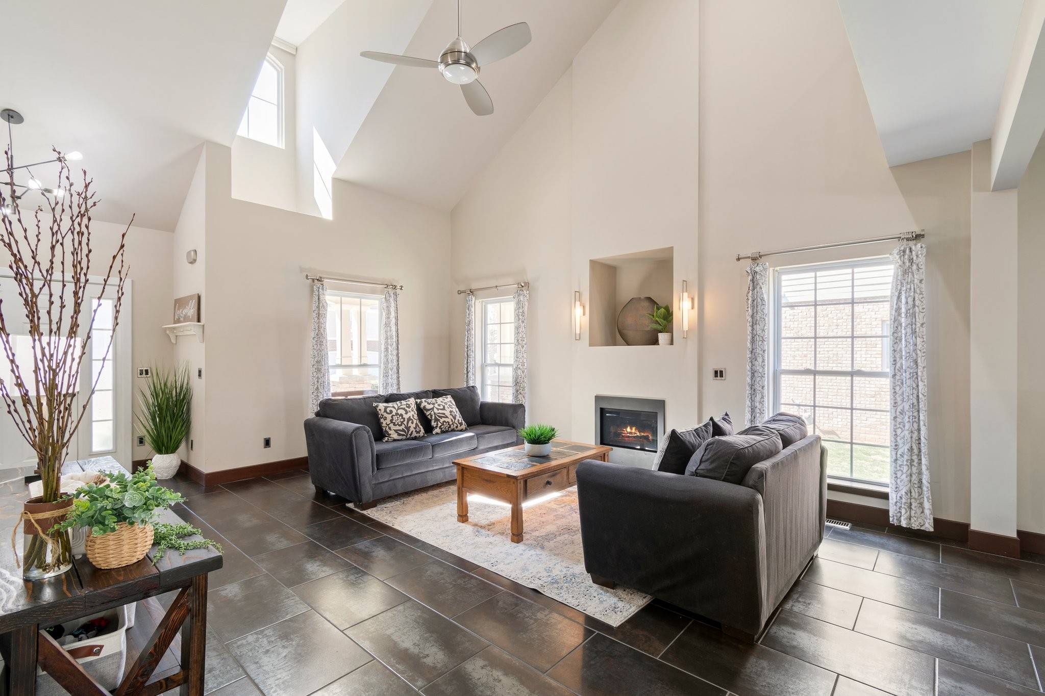 7245 Riverfront Drive Nashville, TN 37221 - Photo 9 of 74 a living room with furniture and a fireplace