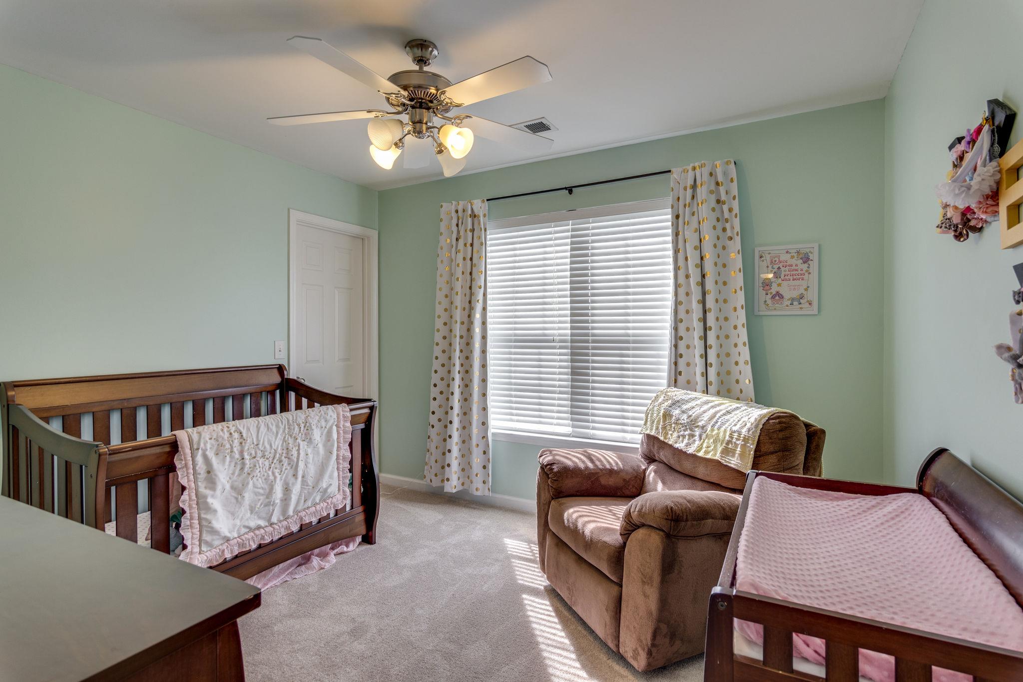 1509 Callender Road Spring Hill, TN 37174 - Photo 21 of 30 a living room with furniture and a window