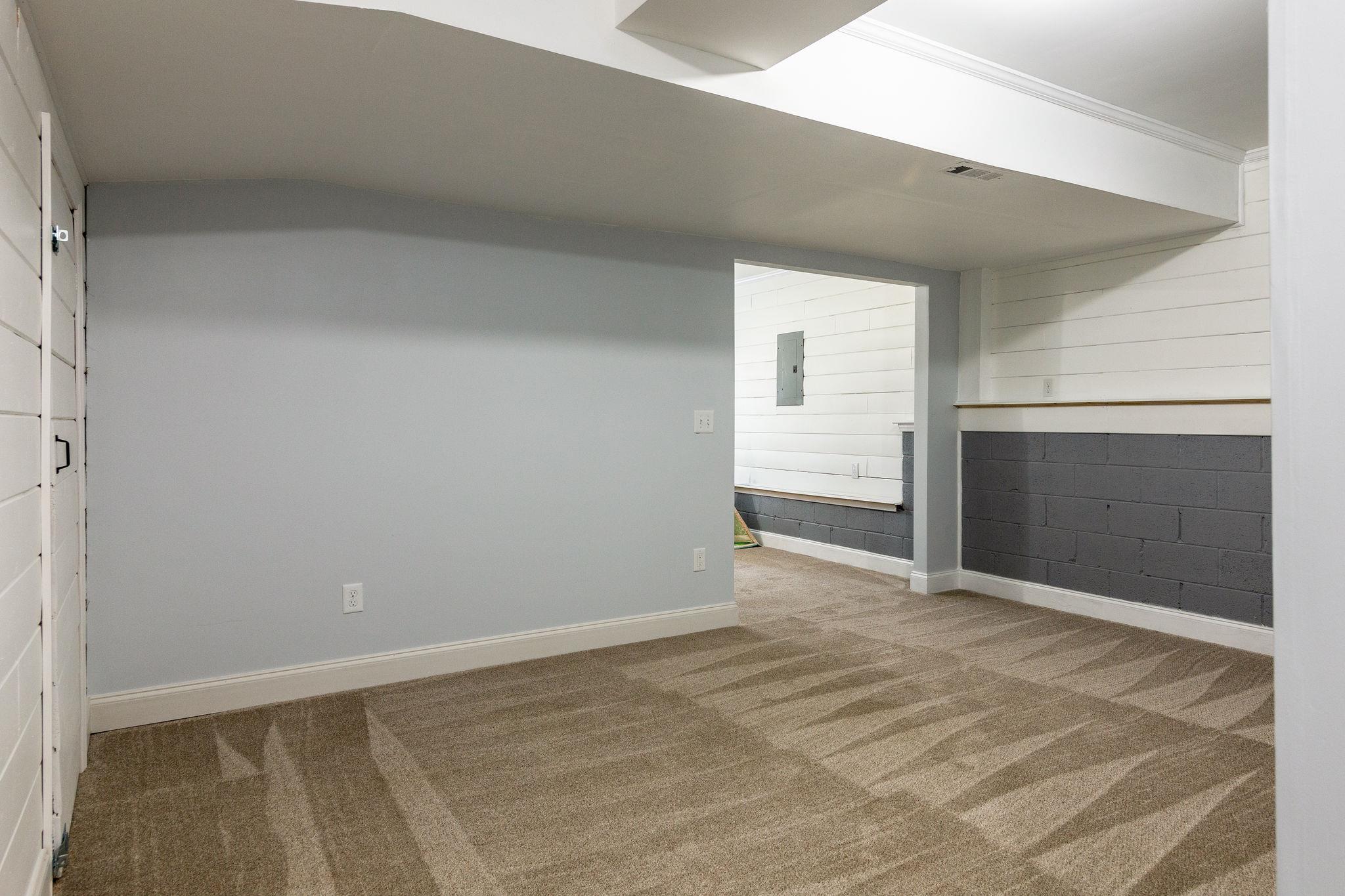 1509 Callender Road Spring Hill, TN 37174 - Photo 24 of 30 a view of an empty room with a fireplace and a window