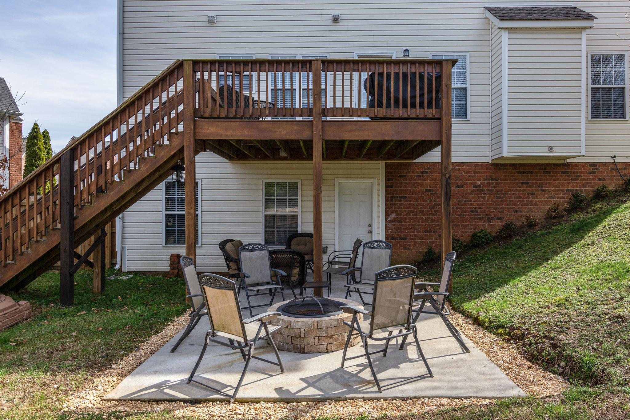 1509 Callender Road Spring Hill, TN 37174 - Photo 28 of 30 a view of backyard with outdoor seating and green space