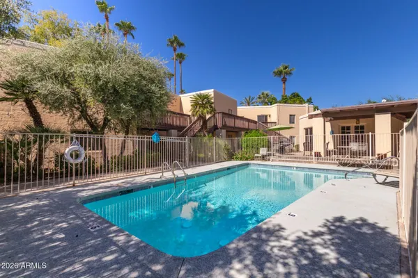 a view of a house with swimming pool