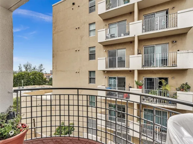 a view of a building from a balcony