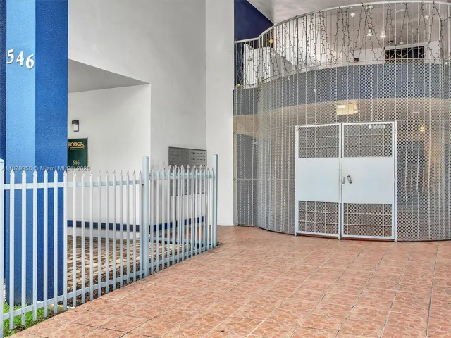 an aerial view of city and lake