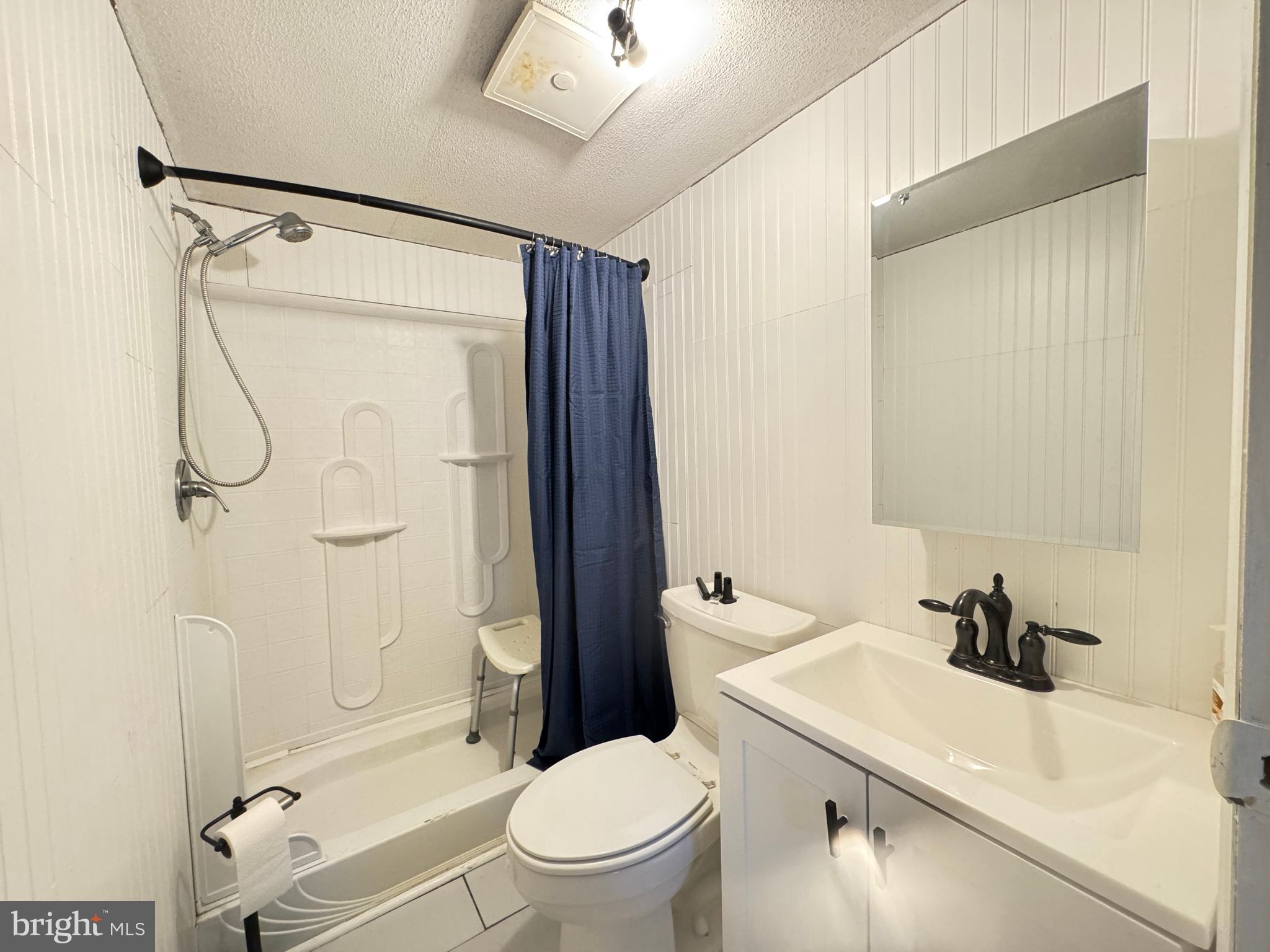 819 Leswood Court Dundalk, MD 21222 - Photo 13 of 18 a bathroom with a sink toilet and shower