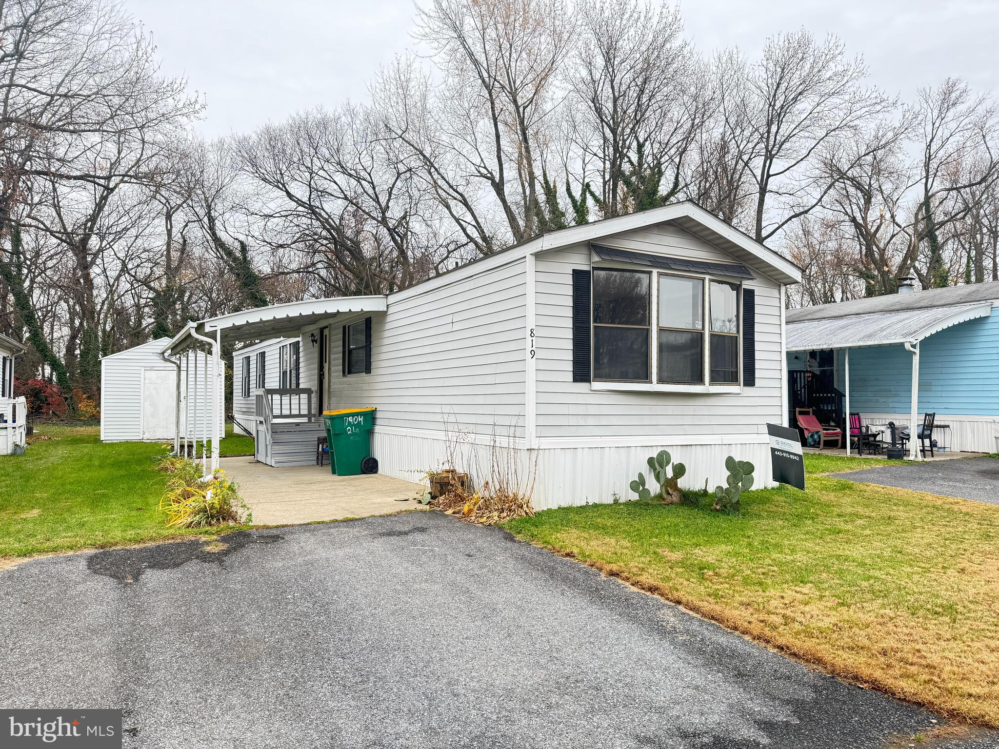 819 Leswood Court Dundalk, MD 21222 - Photo 2 of 18 a front view of a house with swimming pool and porch