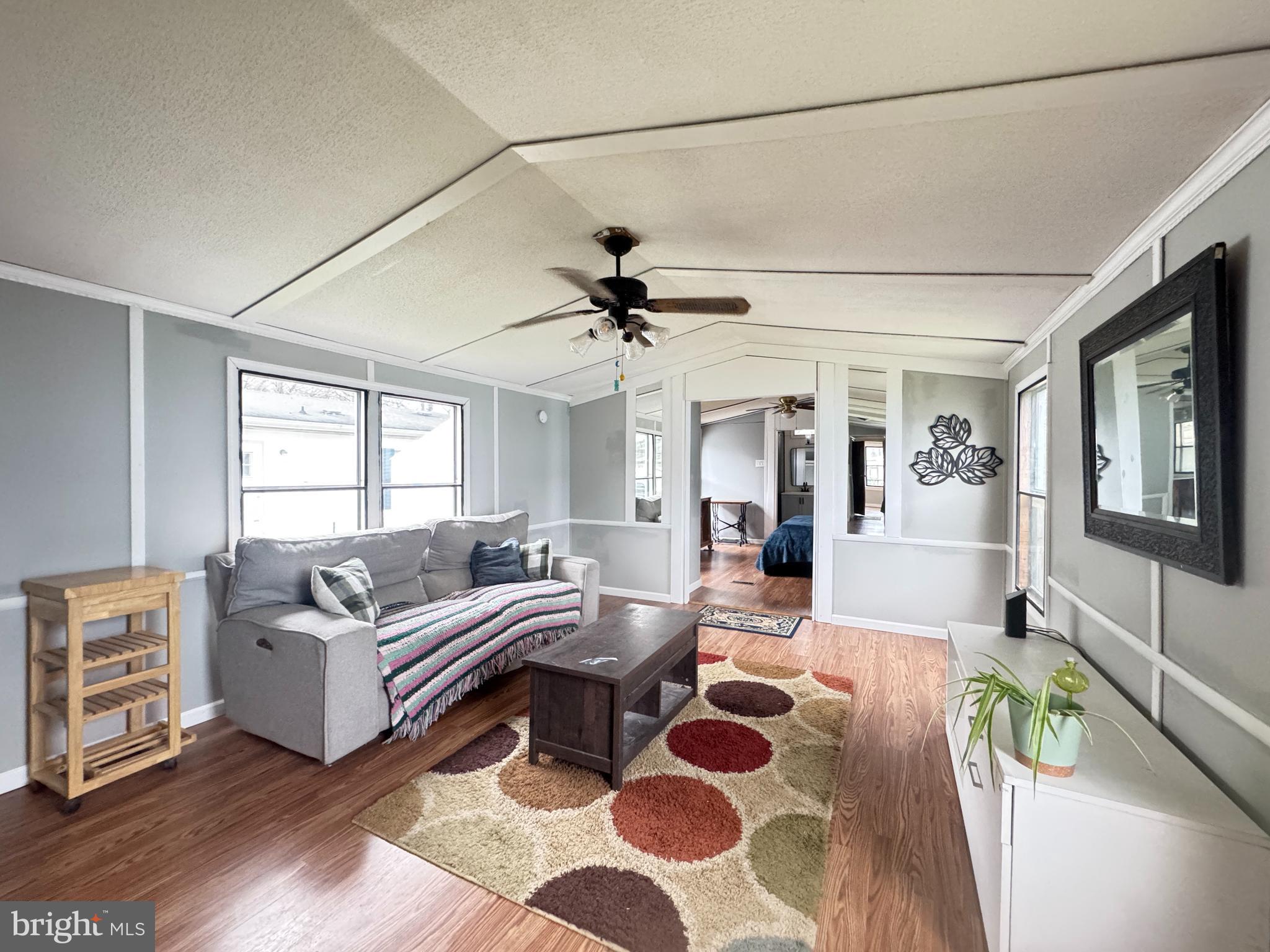819 Leswood Court Dundalk, MD 21222 - Photo 5 of 18 a living room with furniture and a large window