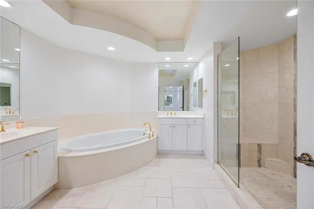 a view of a bathroom with a shower and a sink