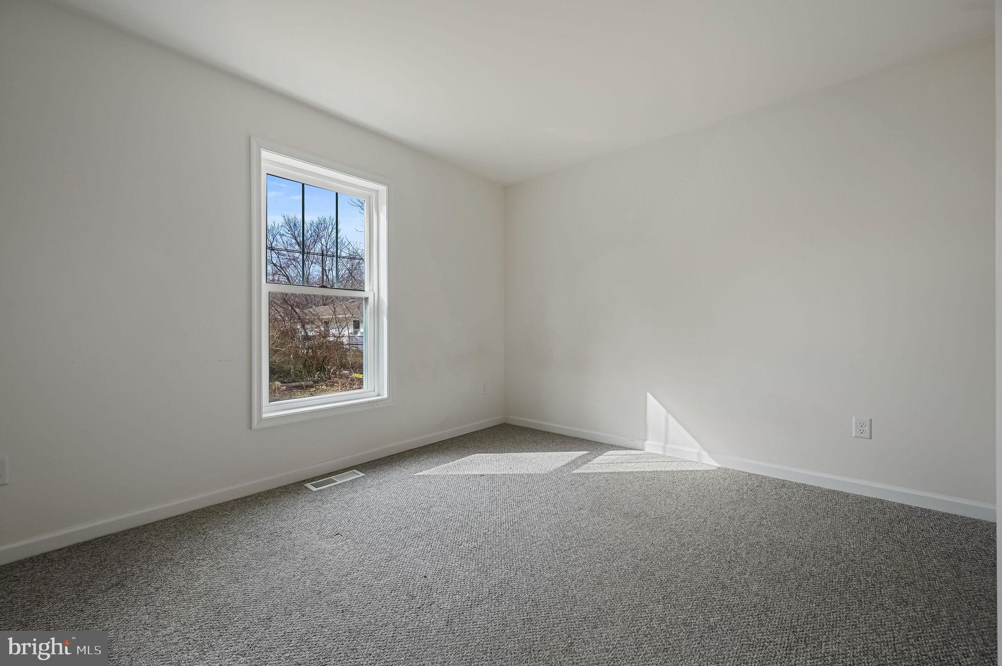 4 Senator Avenue Dover, DE 19901 - Photo 15 of 26 an empty room with windows