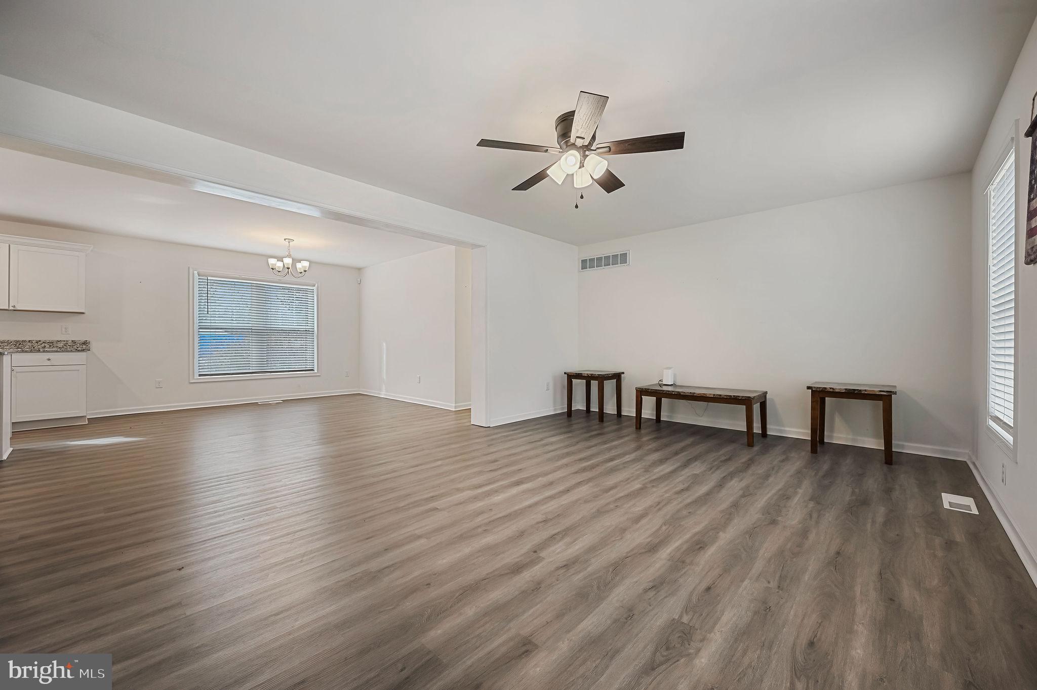 4 Senator Avenue Dover, DE 19901 - Photo 9 of 26 a view of empty room with wooden floor and fan