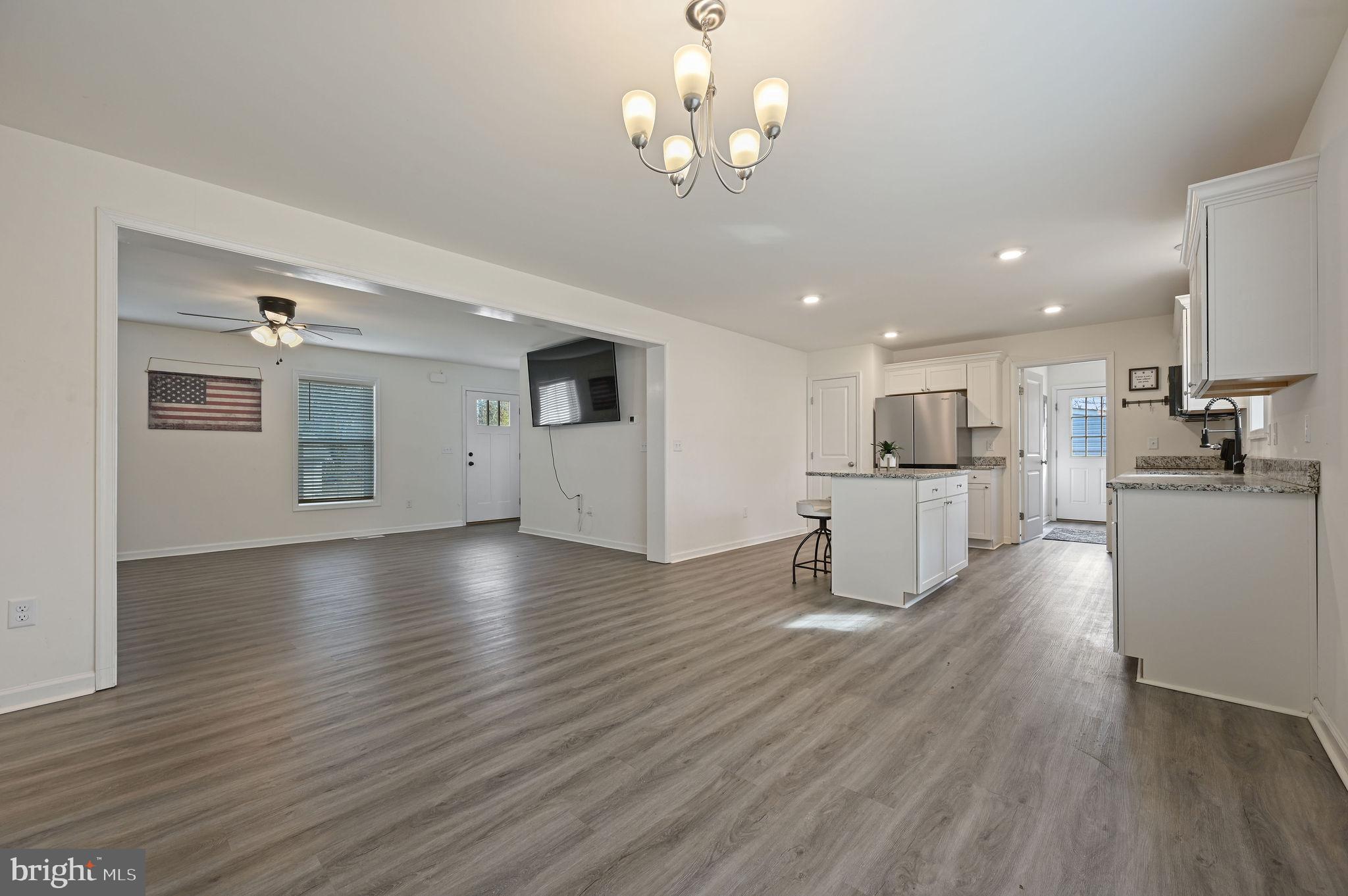 4 Senator Avenue Dover, DE 19901 - Photo 10 of 26 a view of kitchen with cabinets and wooden floor