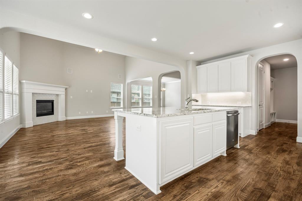 1506 Mariners Hope Way Wylie, TX 75098 - Photo 14 of 39 a kitchen with sink and cabinets